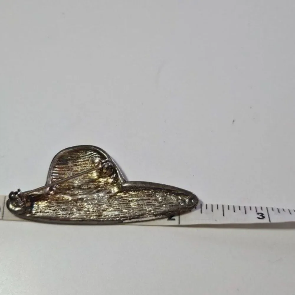 Gold tone red hat society brooch